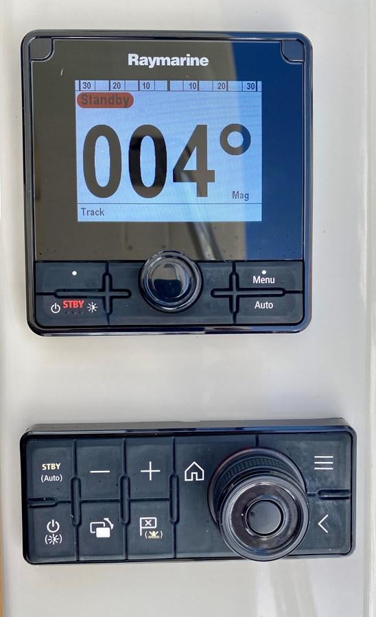 a close-up of a digital device aboard SEARENITY II Yacht for Sale