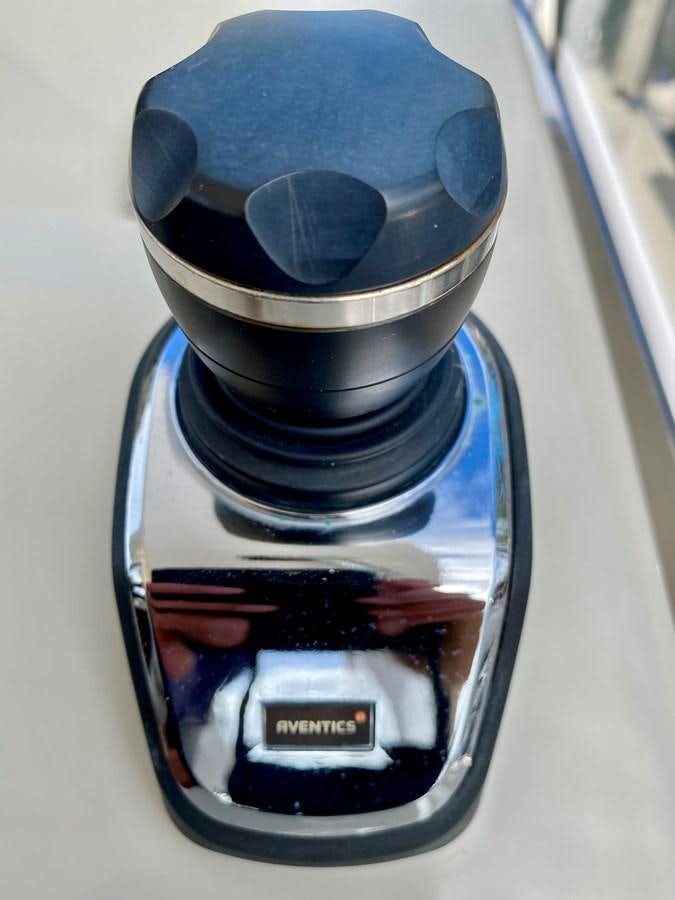 a blue and black can aboard SEARENITY II Yacht for Sale