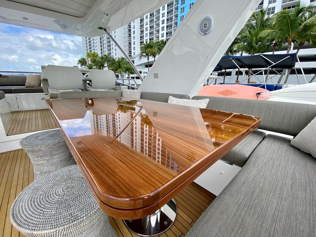 a deck with a deck and chairs aboard SEARENITY II Yacht for Sale