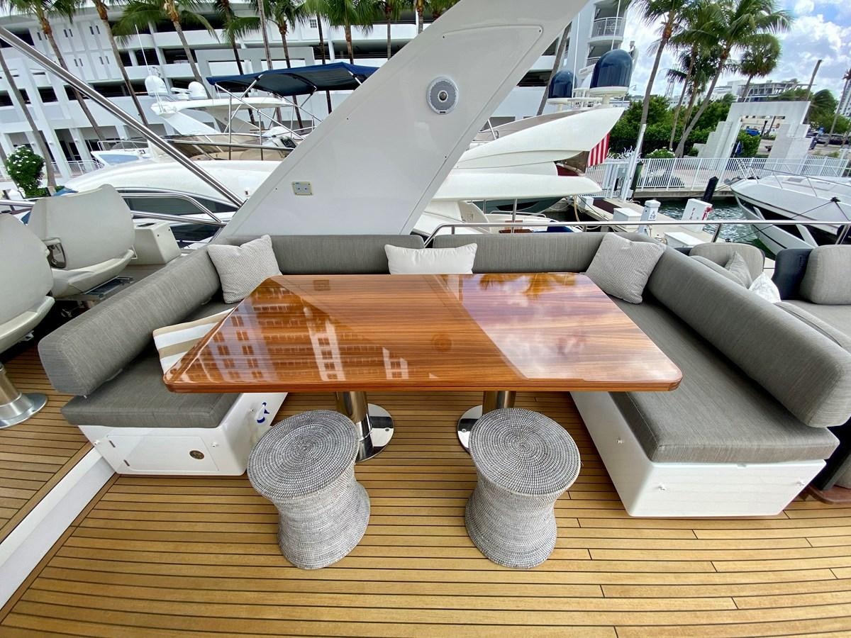 a wooden model of a plane aboard SEARENITY II Yacht for Sale