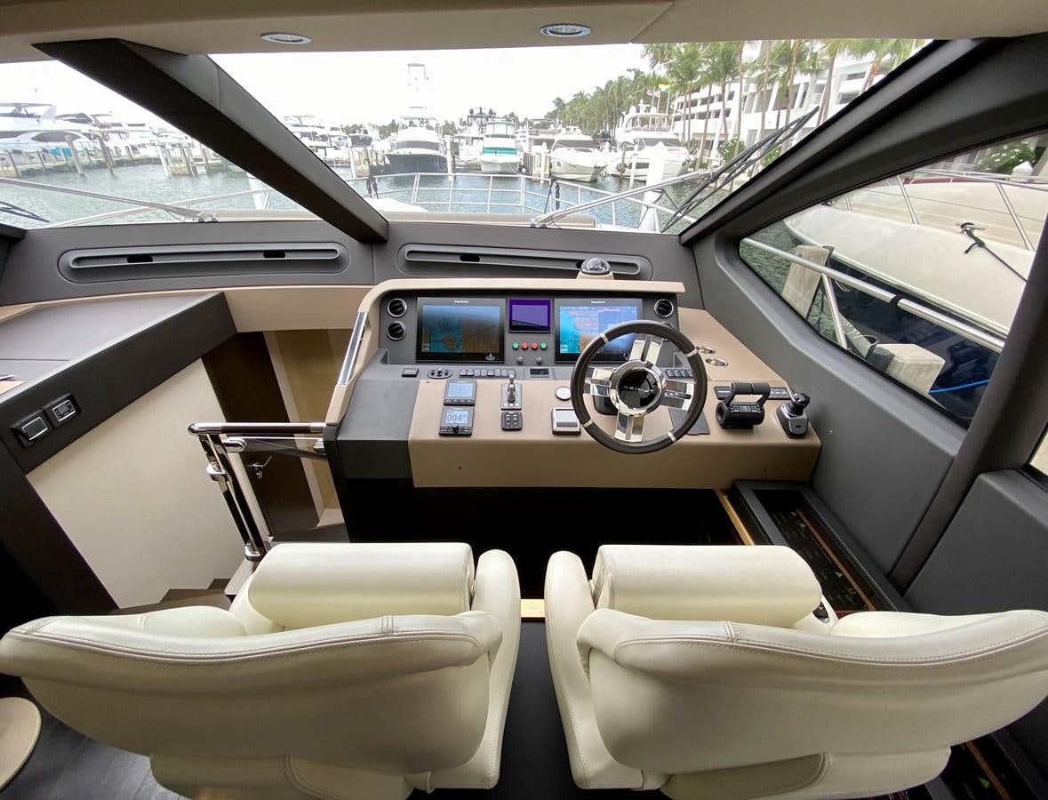 inside of a car aboard SEARENITY II Yacht for Sale