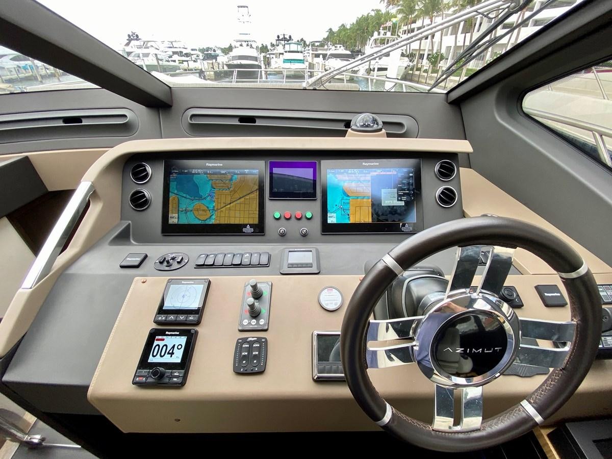 the inside of a car aboard SEARENITY II Yacht for Sale