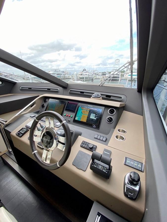 inside of a car aboard SEARENITY II Yacht for Sale
