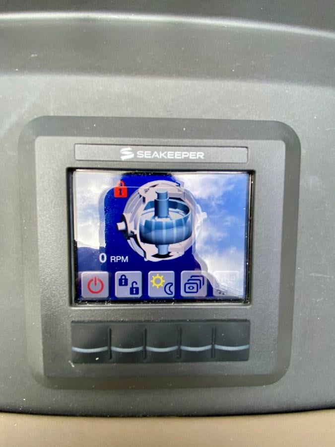 a rectangular electronic device aboard SEARENITY II Yacht for Sale