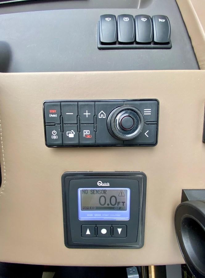 a close-up of a radio aboard SEARENITY II Yacht for Sale
