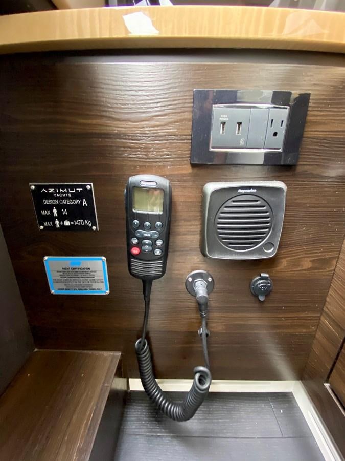 a cell phone and a charger aboard SEARENITY II Yacht for Sale