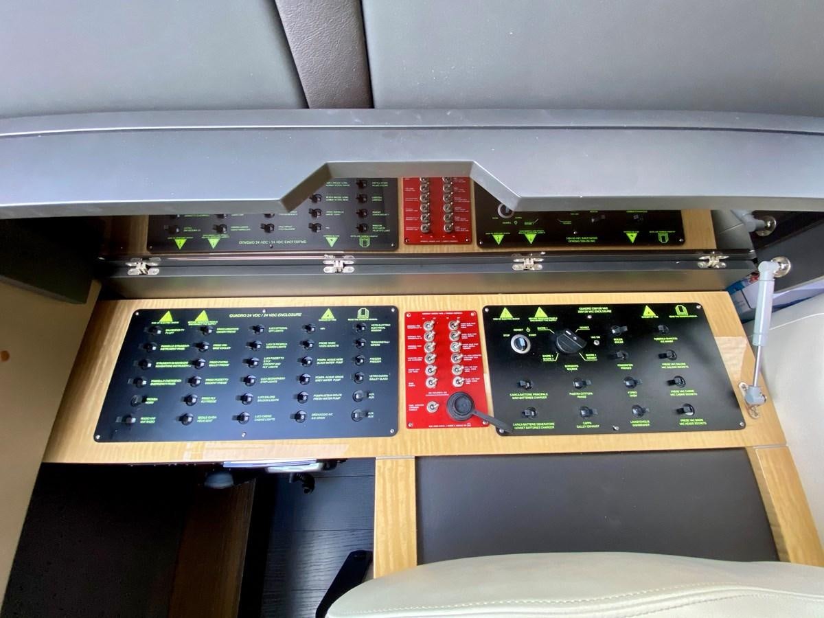 a computer with a blue keyboard aboard SEARENITY II Yacht for Sale