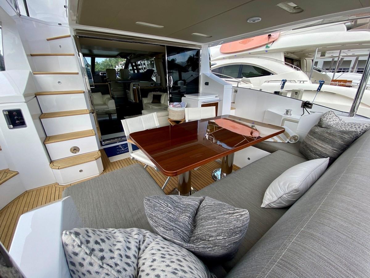 a boat in a room aboard SEARENITY II Yacht for Sale
