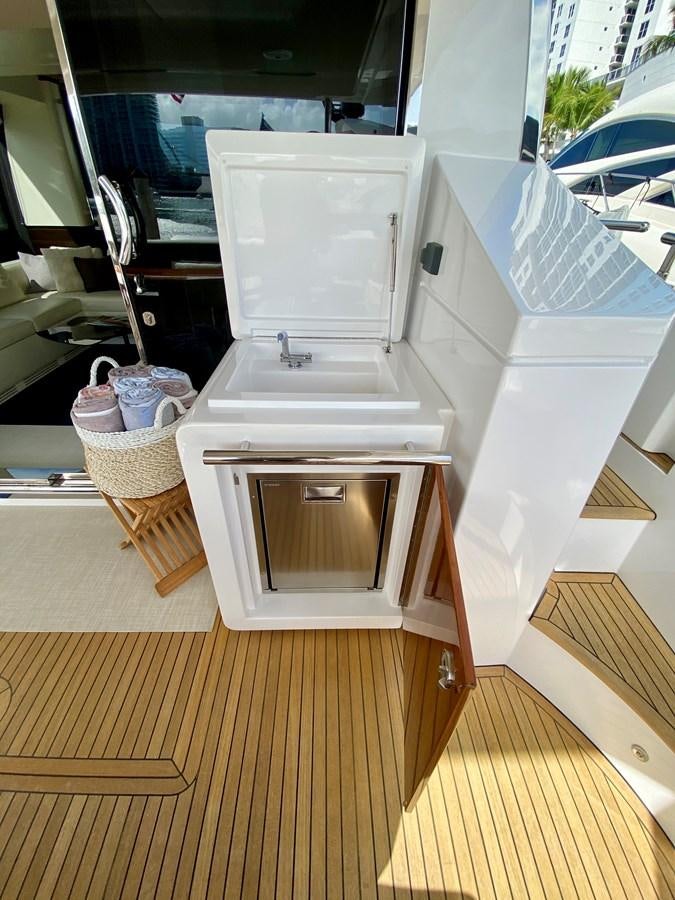a kitchen with a microwave oven aboard SEARENITY II Yacht for Sale