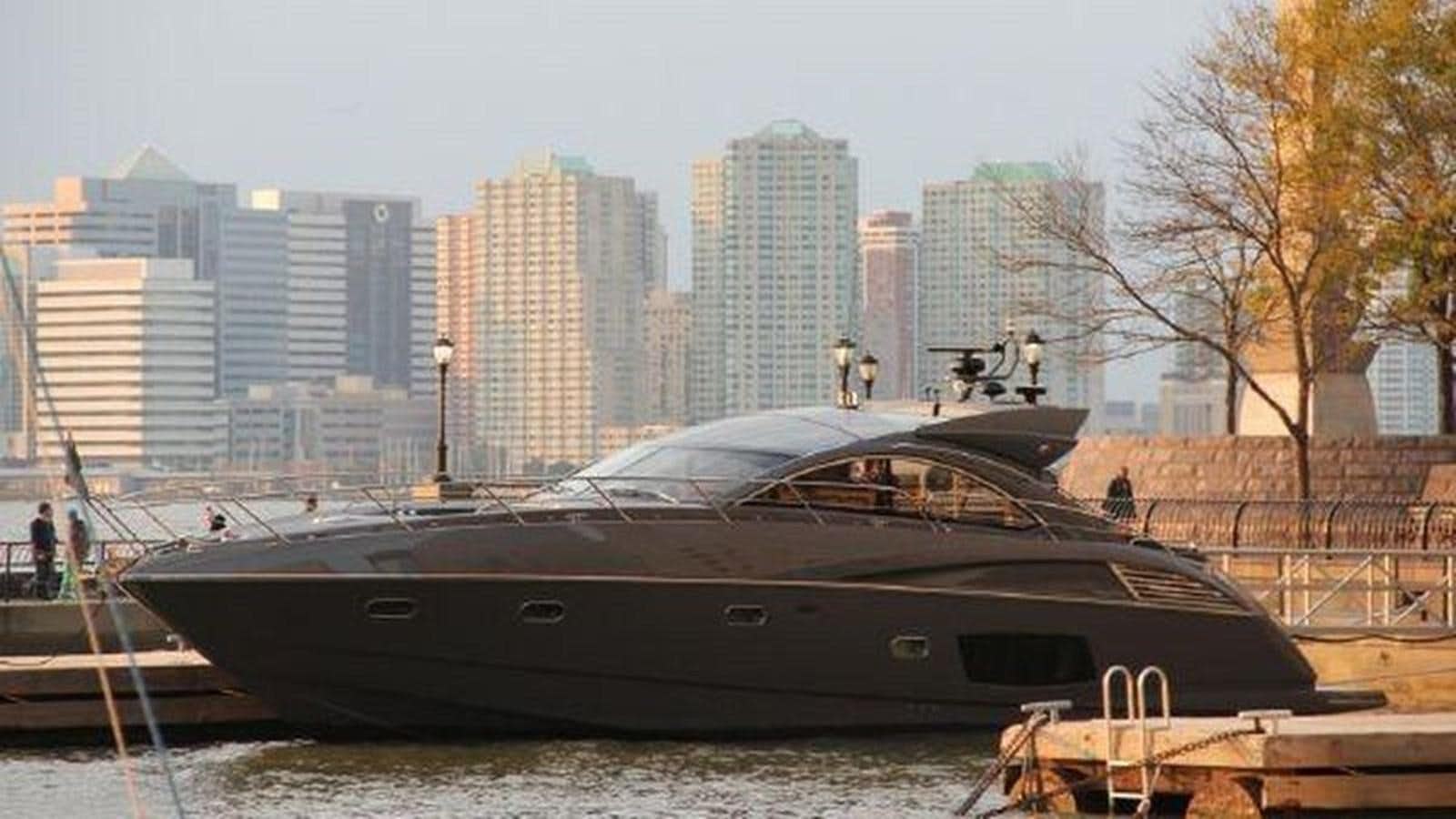 a boat parked on the water aboard YOUNG GUNS Yacht for Sale