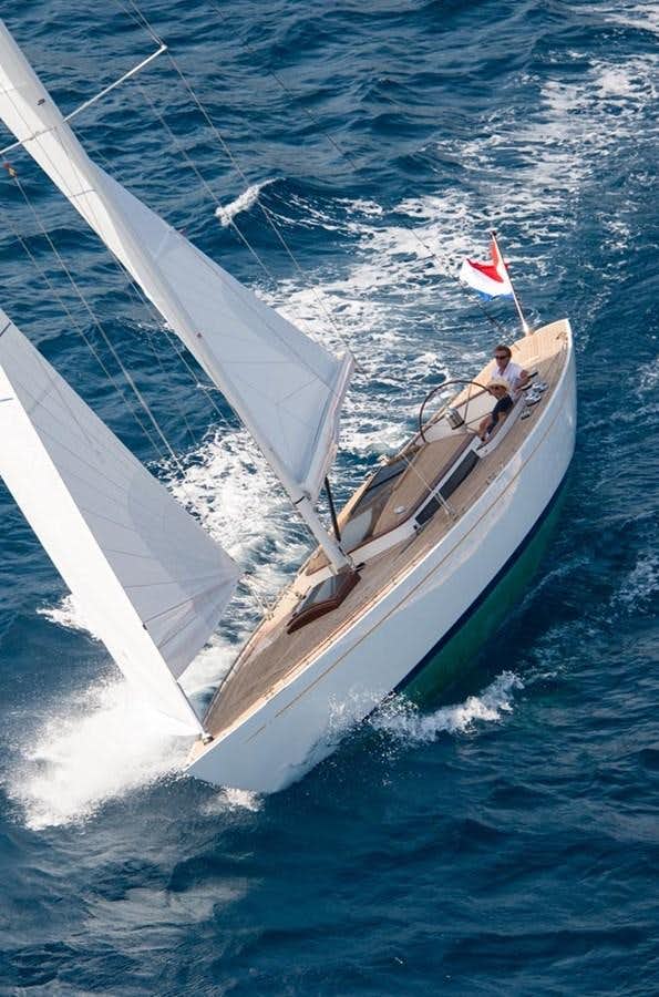 a sailboat with two people on it aboard EAGLE 54 Yacht for Sale