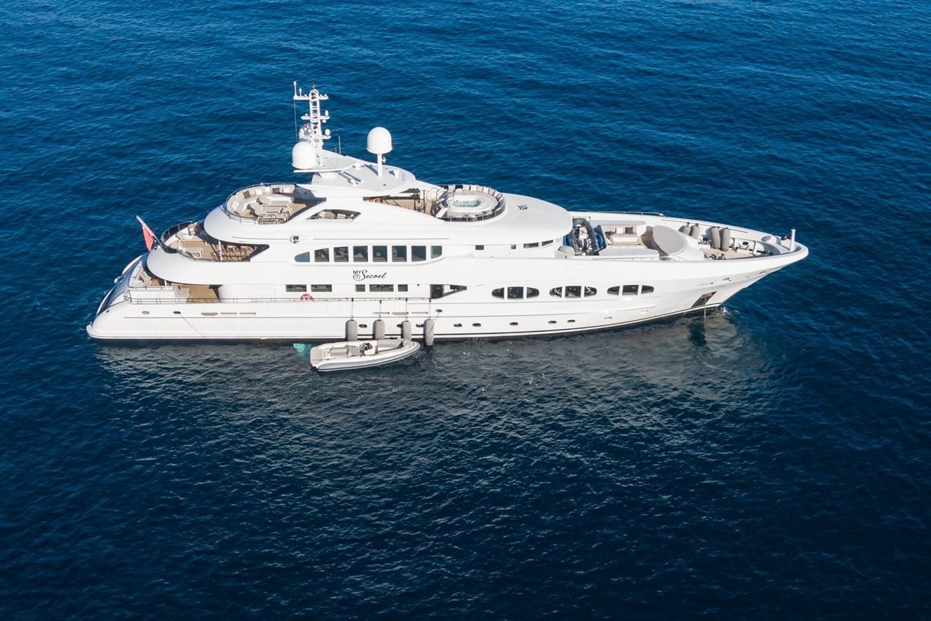 a large white ship in the water aboard MY SECRET Yacht for Sale