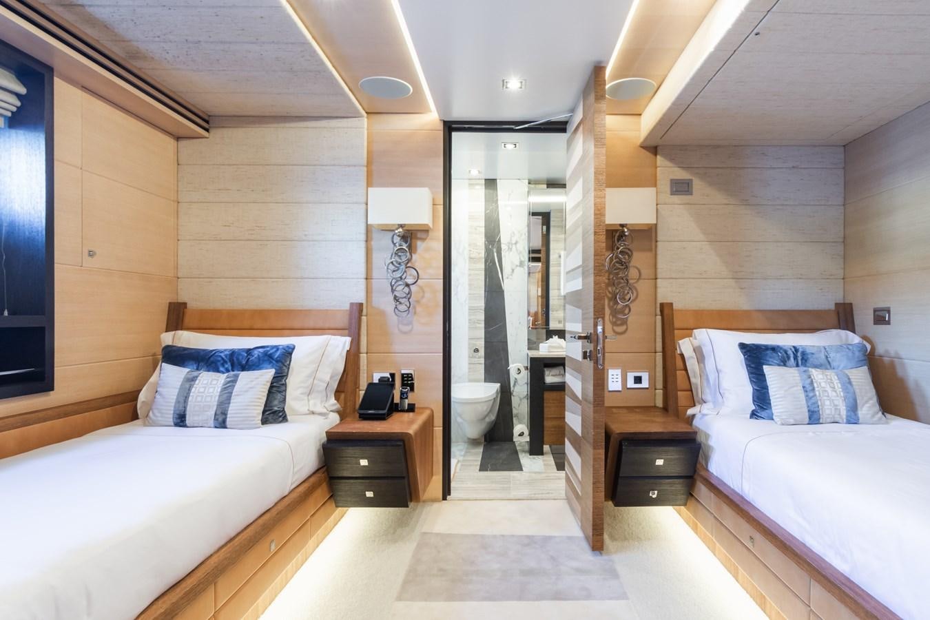 a room with two beds aboard MY SECRET Yacht for Sale