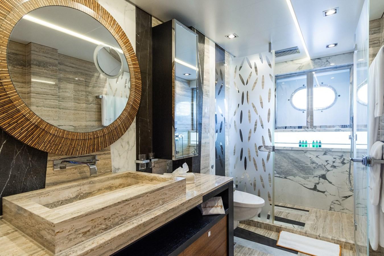 a bathroom with a large mirror aboard MY SECRET Yacht for Sale