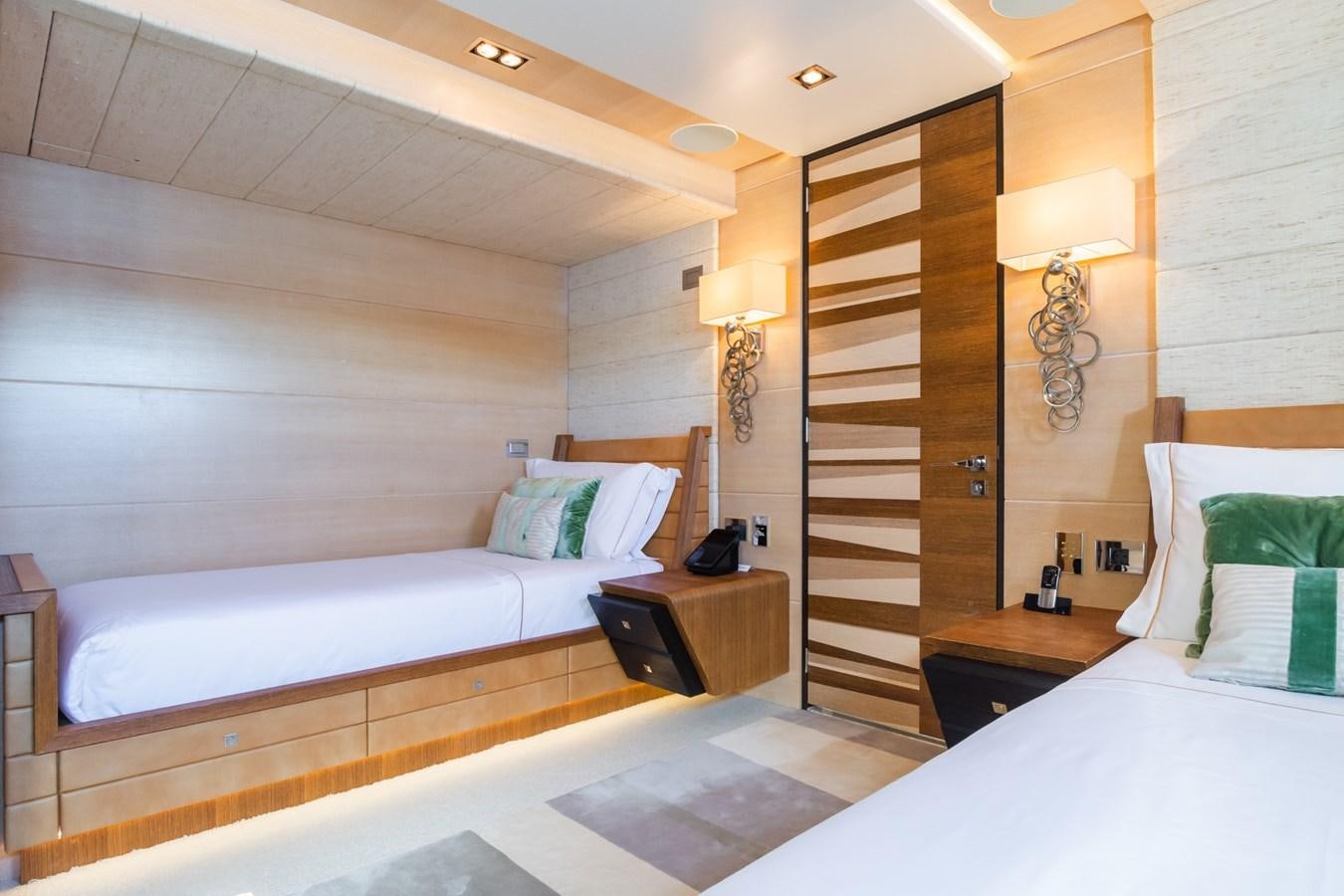 a room with a bed and a closet aboard MY SECRET Yacht for Sale