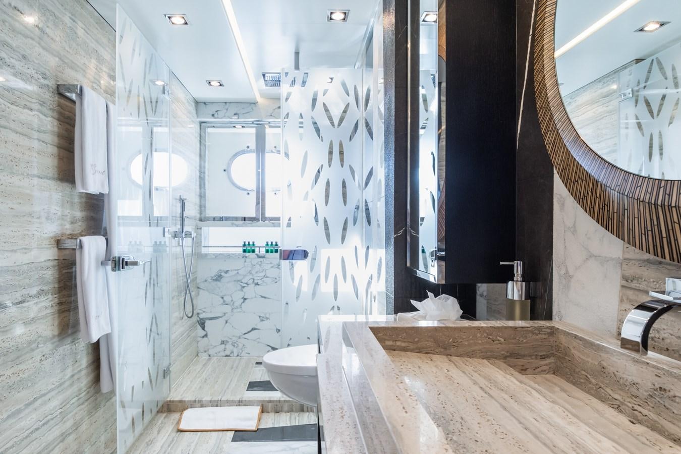 a bathroom with a large mirror aboard MY SECRET Yacht for Sale