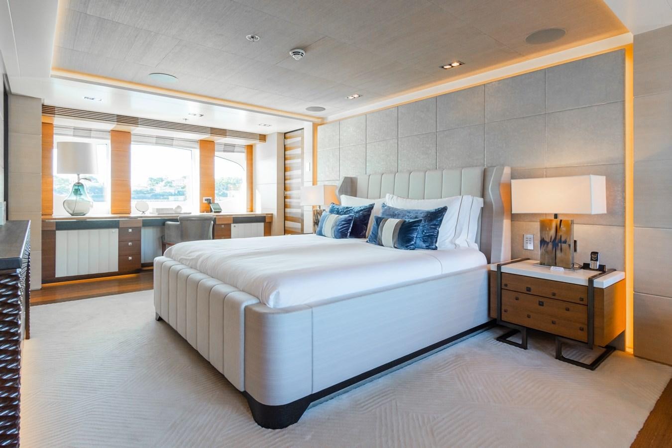 a large bedroom with a large bed aboard MY SECRET Yacht for Sale