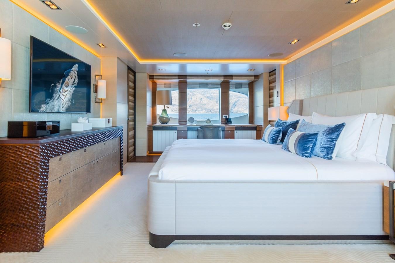 a room with a bed and a tv aboard MY SECRET Yacht for Sale