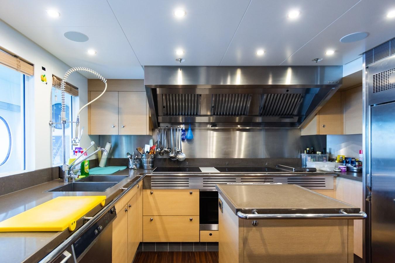 a kitchen with a stove and a sink aboard MY SECRET Yacht for Sale