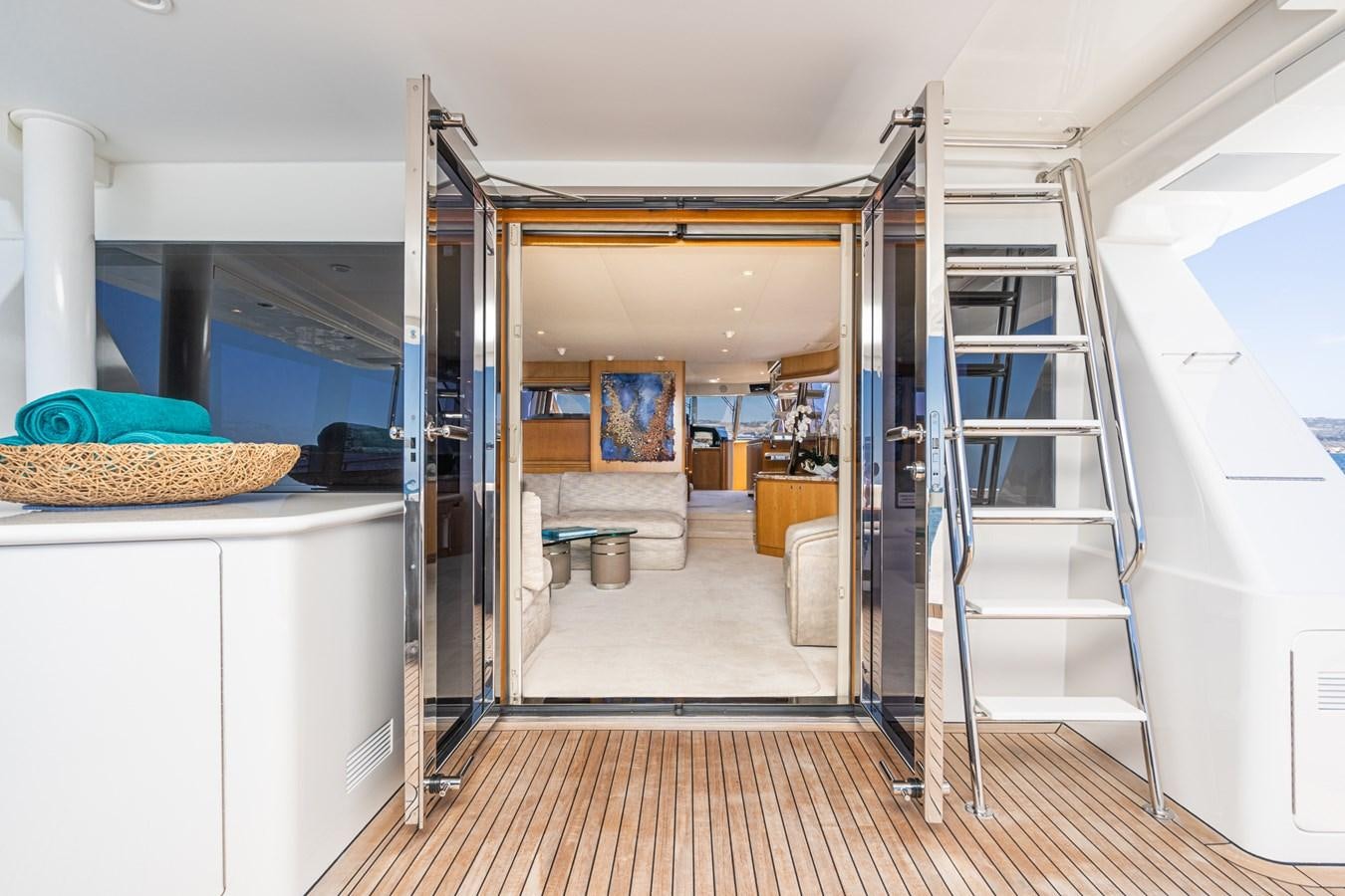 a room with a ladder and a bed aboard ESOTERIC Yacht for Sale