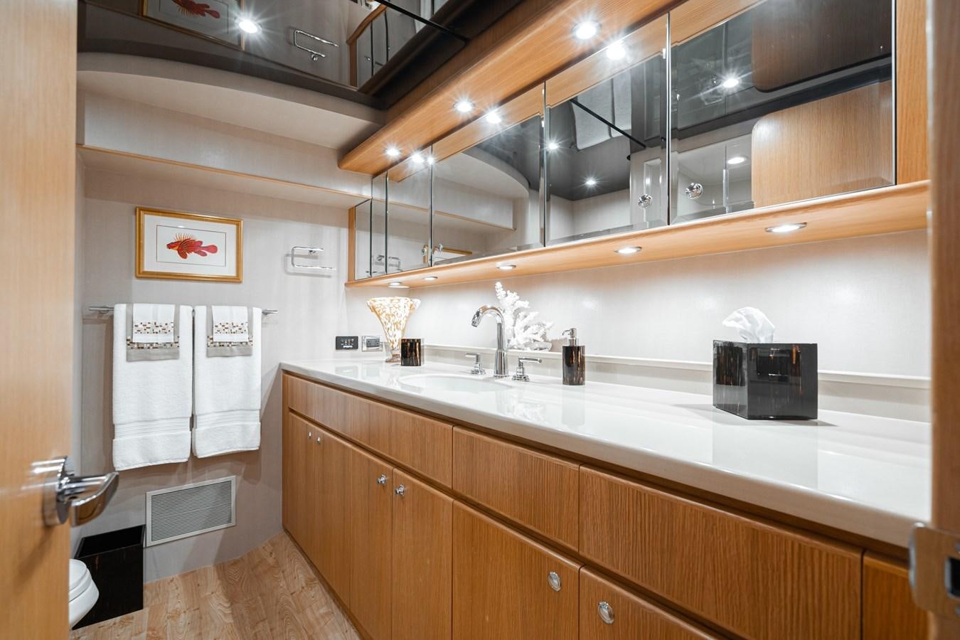 a kitchen with a sink and microwave aboard ESOTERIC Yacht for Sale