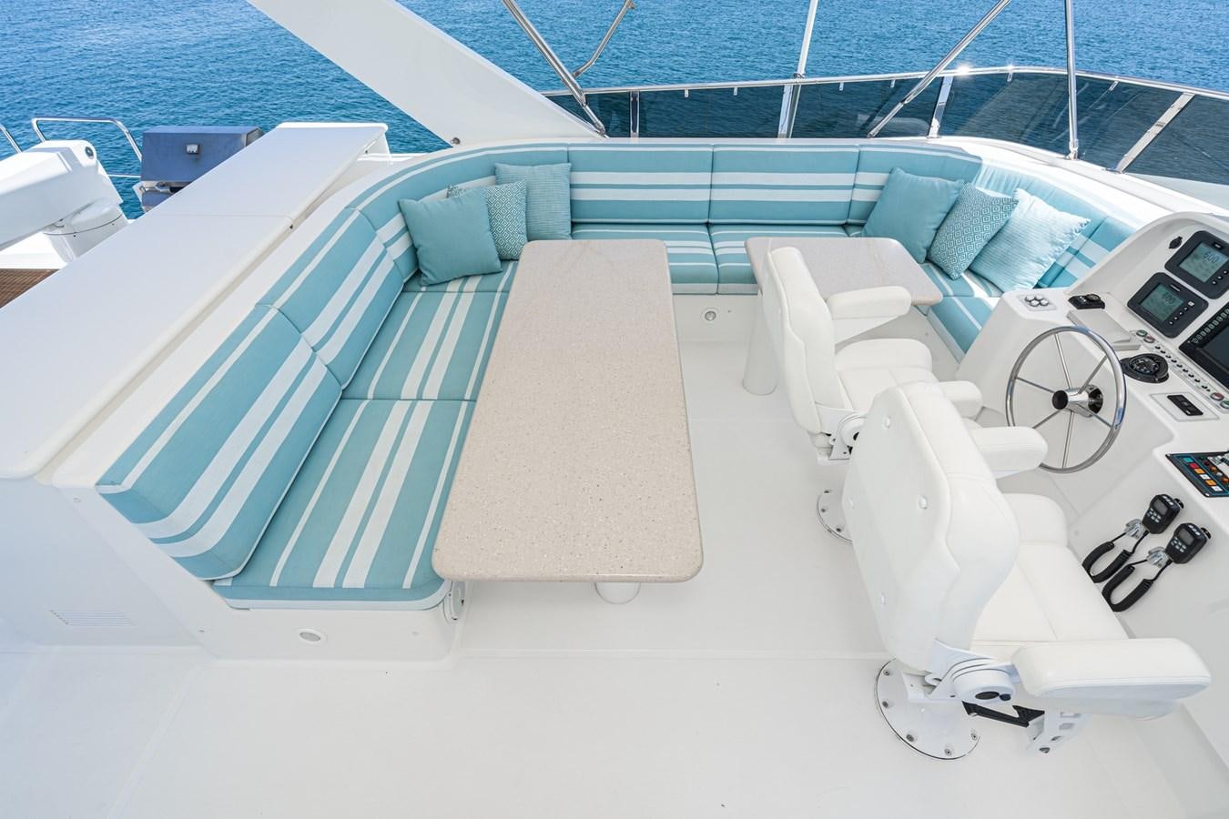 a white lounge chair on a boat aboard ESOTERIC Yacht for Sale