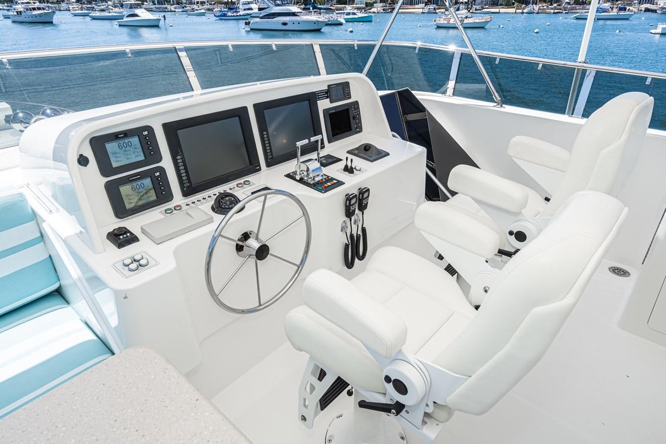 a boat with a steering wheel aboard ESOTERIC Yacht for Sale