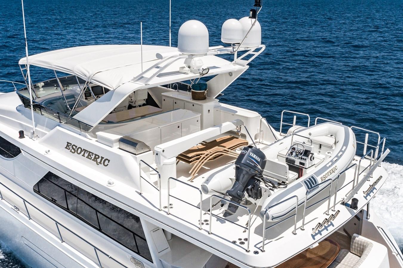 a white boat with a metal bar on the front aboard ESOTERIC Yacht for Sale