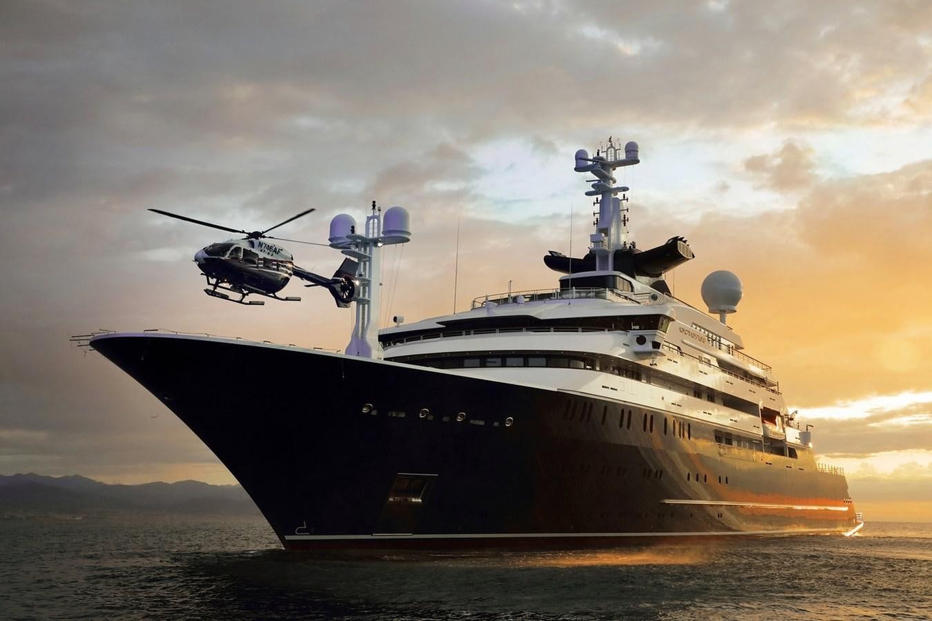 a large ship on the water aboard OCTOPUS Yacht for Sale