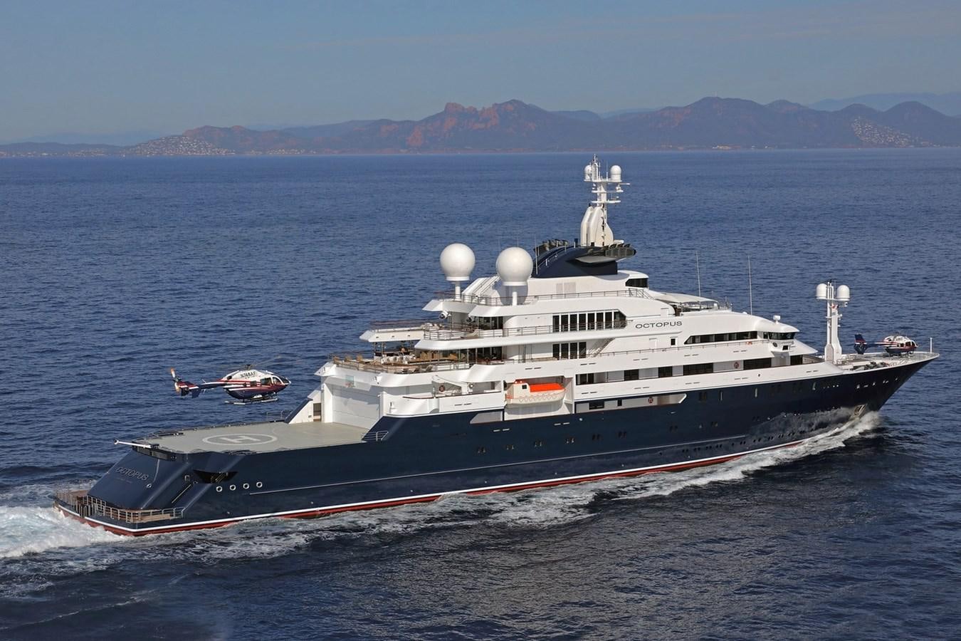 a large ship in the water aboard OCTOPUS Yacht for Sale