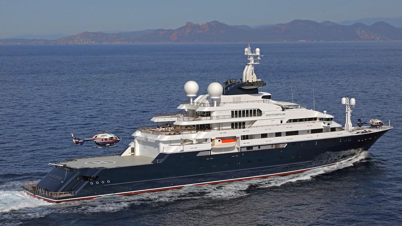 a large ship in the water aboard OCTOPUS Yacht for Sale