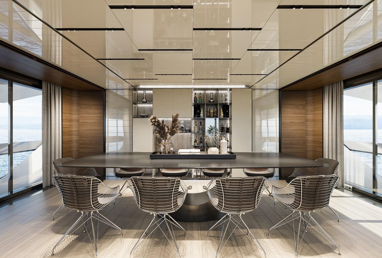 a room with a table and chairs aboard NIGHT FURY II Yacht for Sale