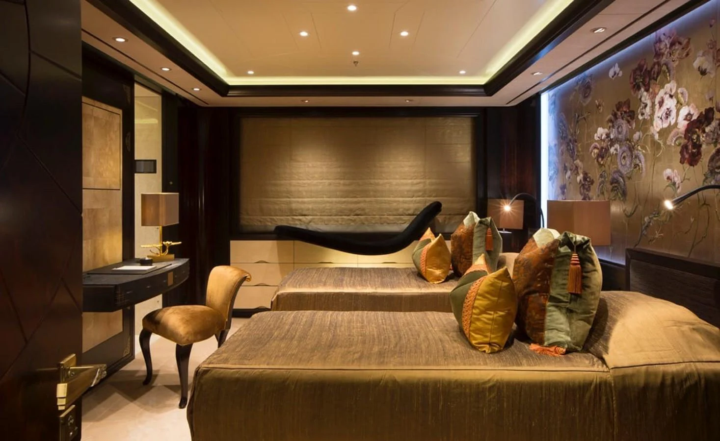 a room with a couch and a tv aboard WHISPER Yacht for Charter