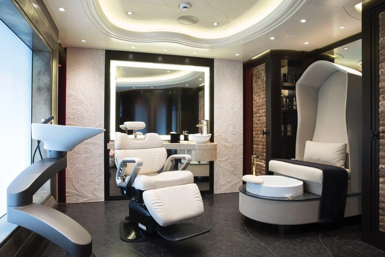 a room with a large mirror and a tub aboard WHISPER Yacht for Charter