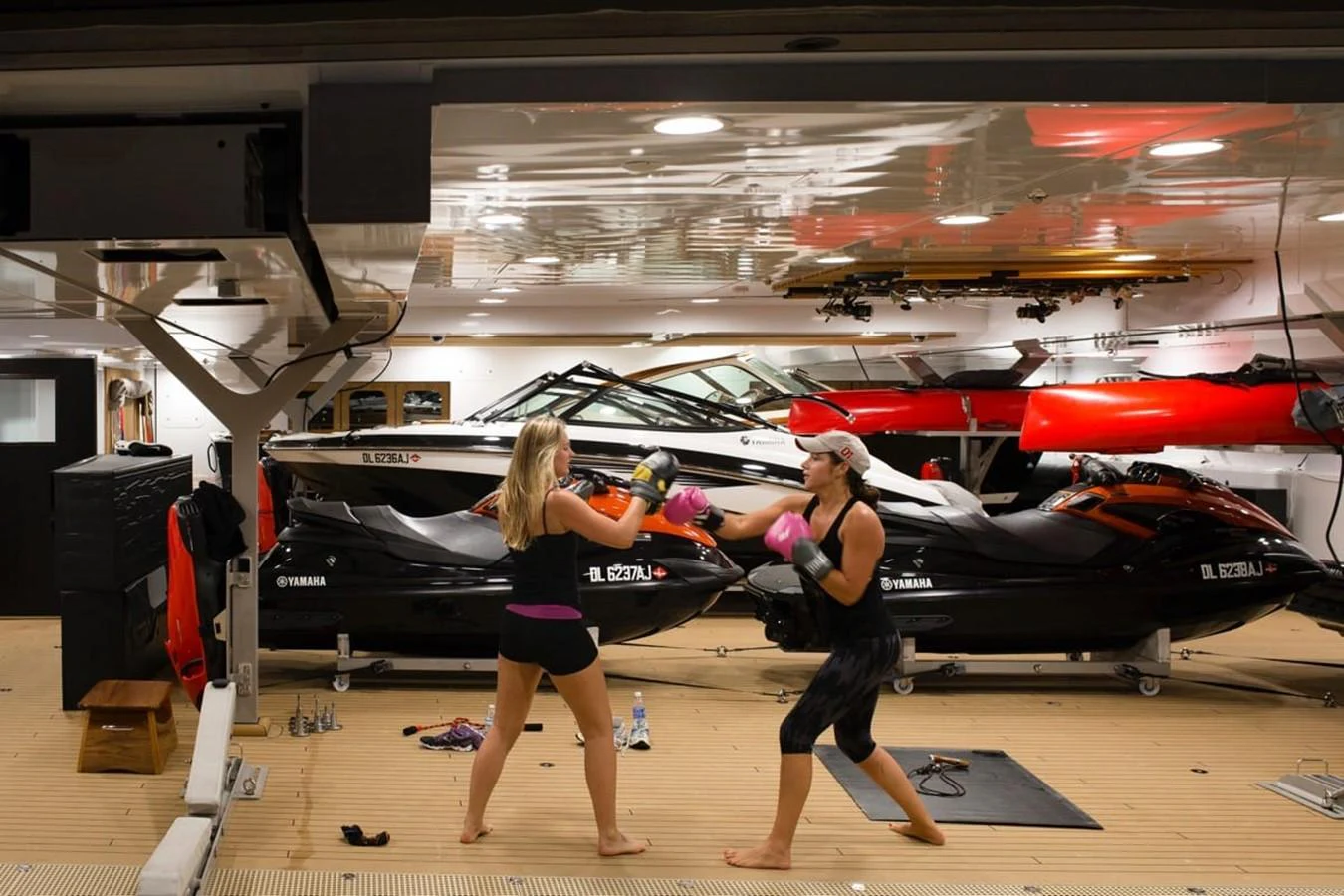 a couple of women in a gym aboard WHISPER Yacht for Charter