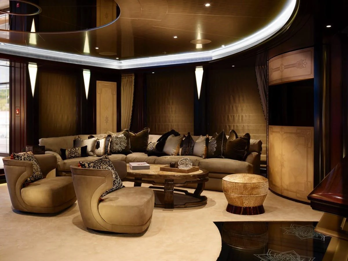 a living room with a large fireplace aboard WHISPER Yacht for Charter