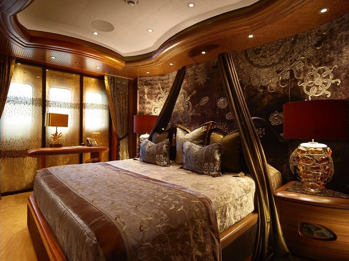 a bedroom with a large bed aboard WHISPER Yacht for Charter
