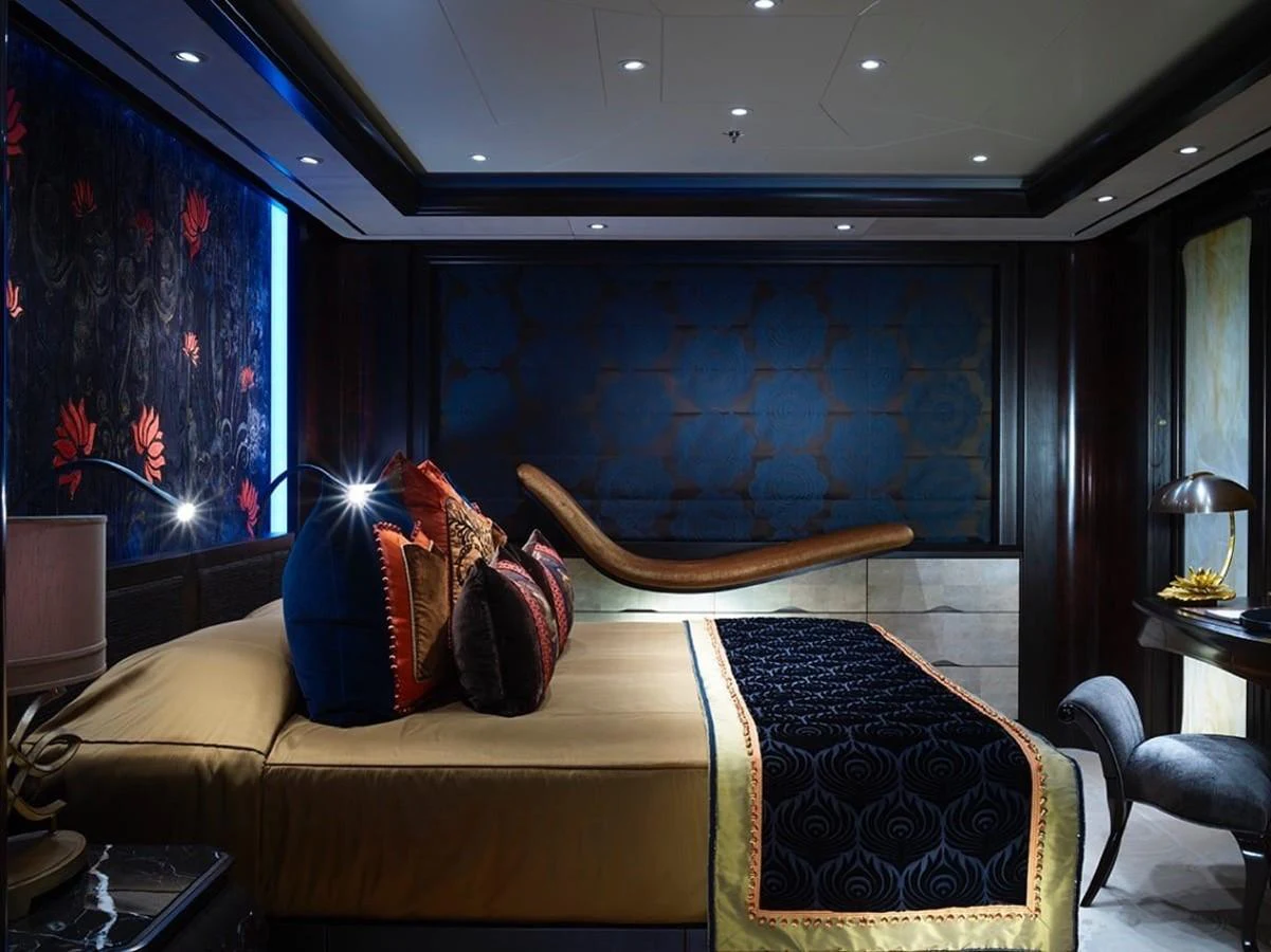 a living room with a large blue wall aboard WHISPER Yacht for Charter