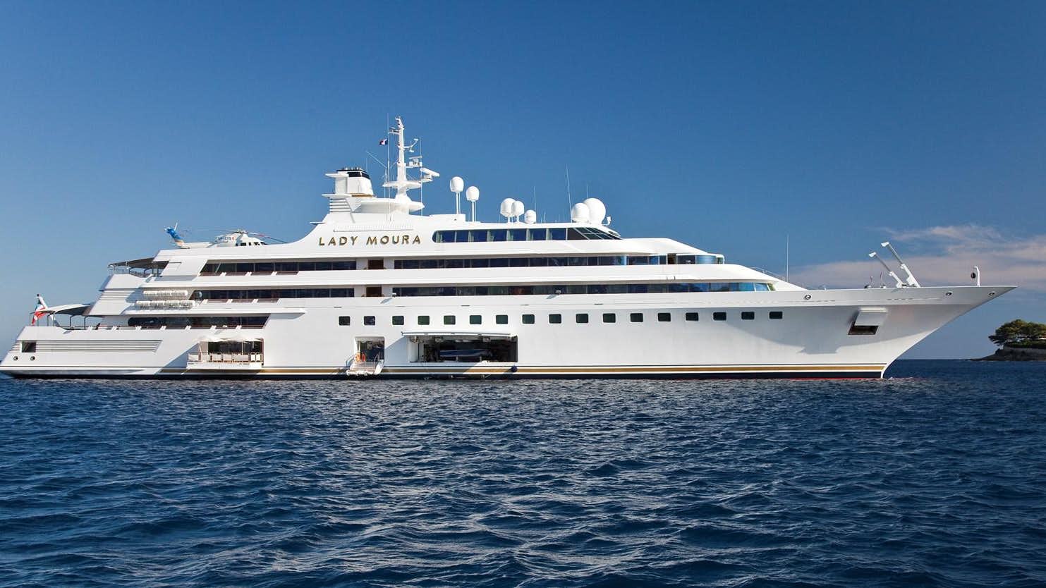 a large white ship in the water aboard LADY MOURA Yacht for Sale