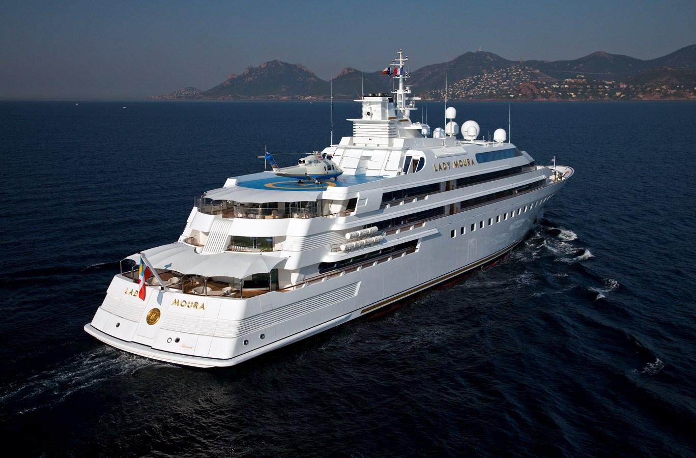 a large white ship in the water aboard LADY MOURA Yacht for Sale