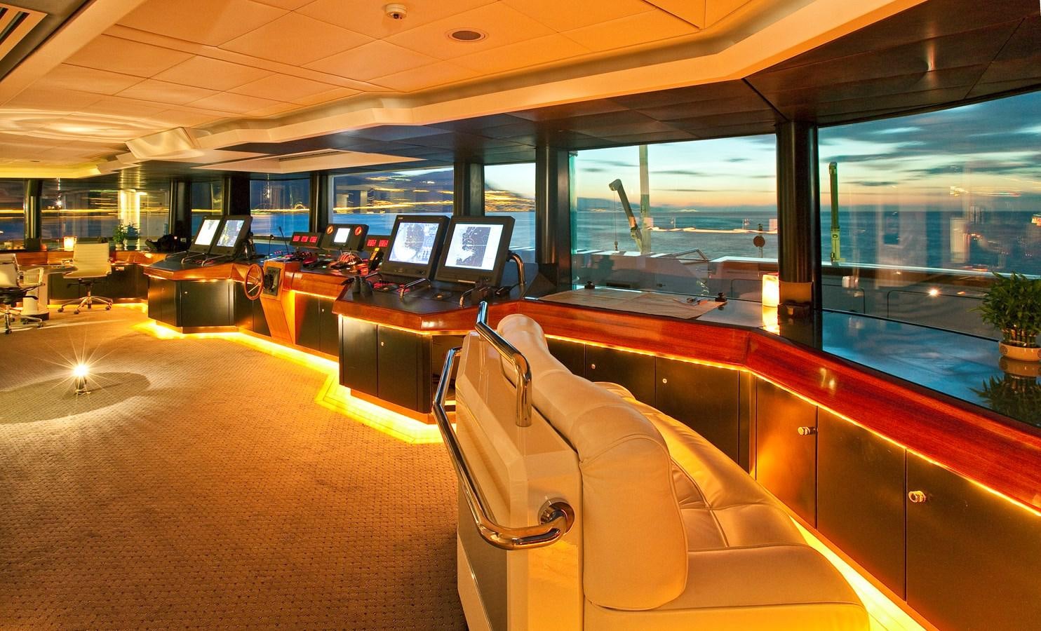 inside of a car with a large window and a view of the city aboard LADY MOURA Yacht for Sale
