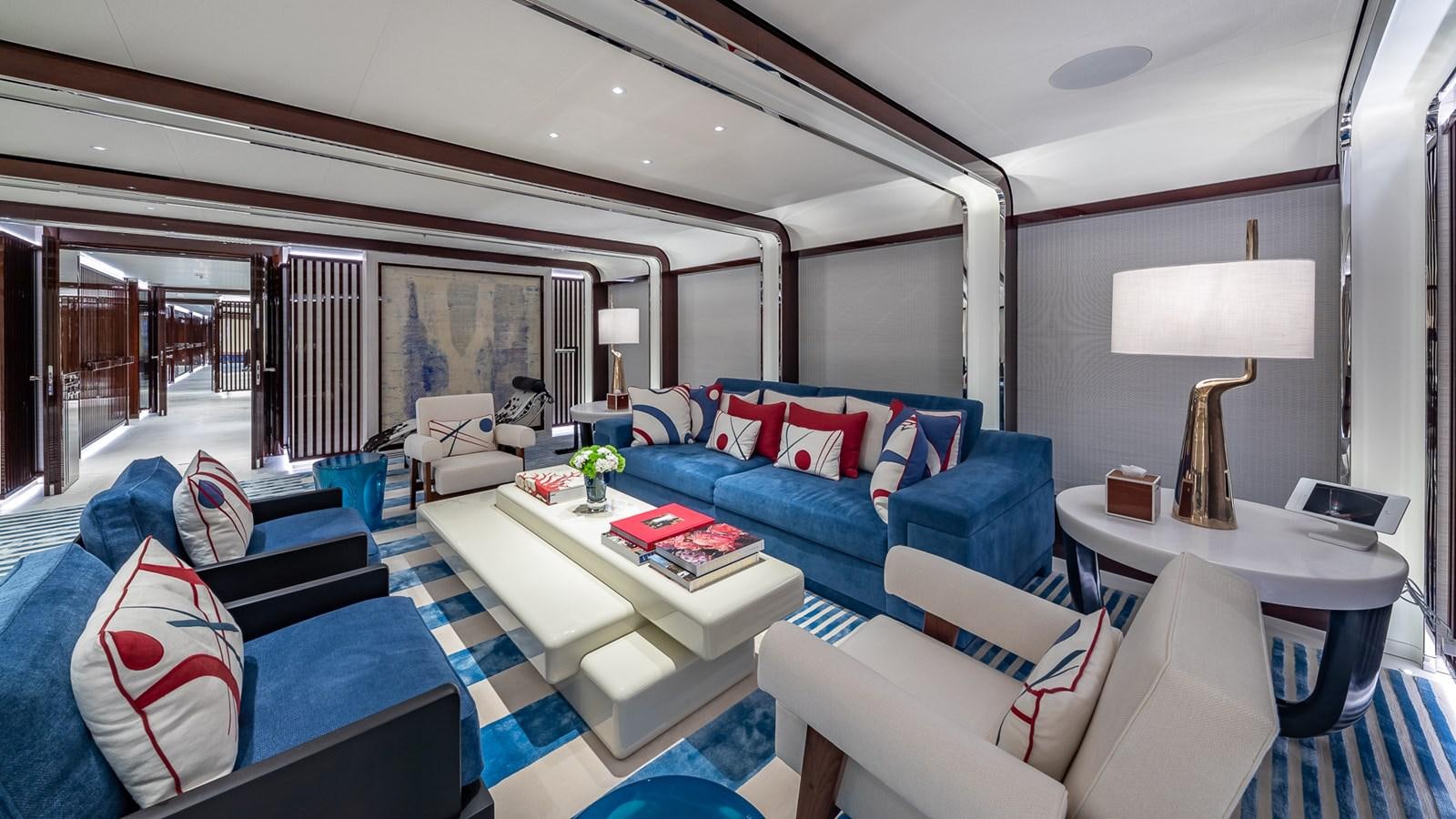 a room with a couch and a table aboard CC-SUMMER Yacht for Sale