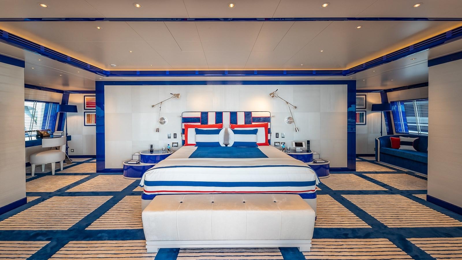 a room with a bed and a desk aboard CC-SUMMER Yacht for Sale