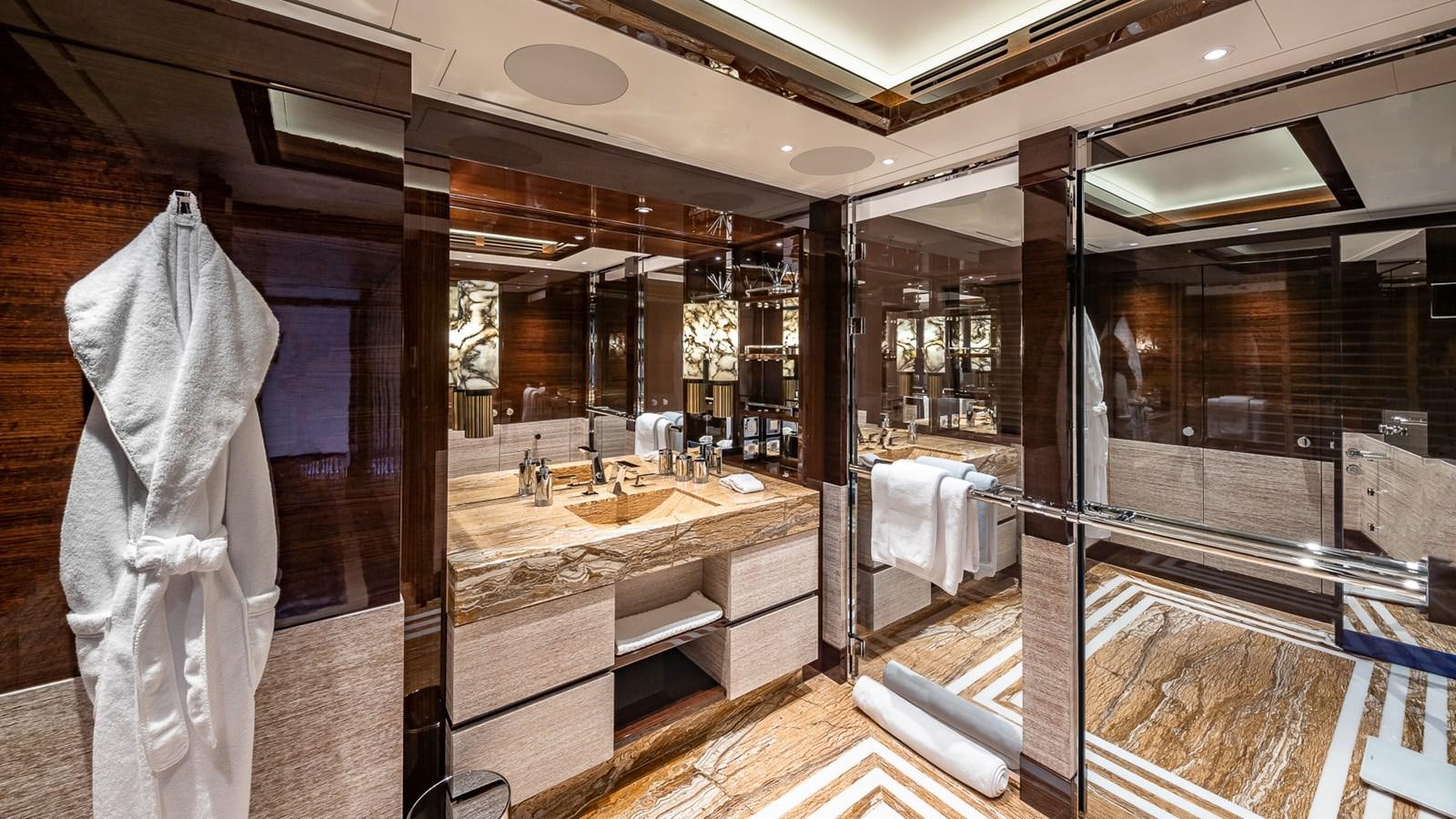a large bathroom with a large mirror aboard CC-SUMMER Yacht for Sale