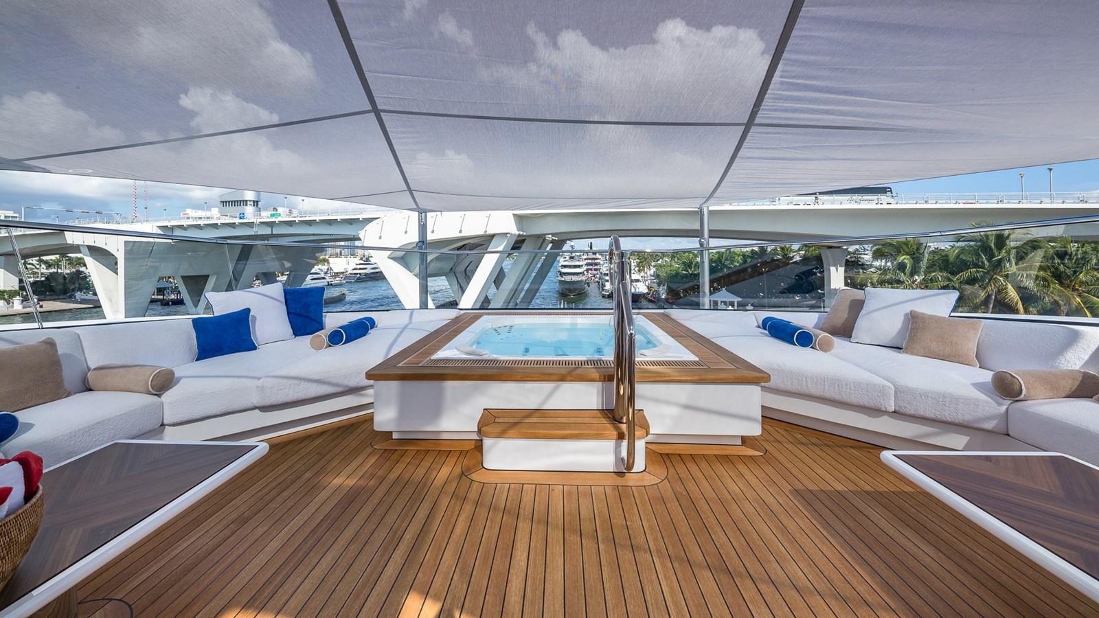 a room with a couch and a pool aboard CC-SUMMER Yacht for Sale