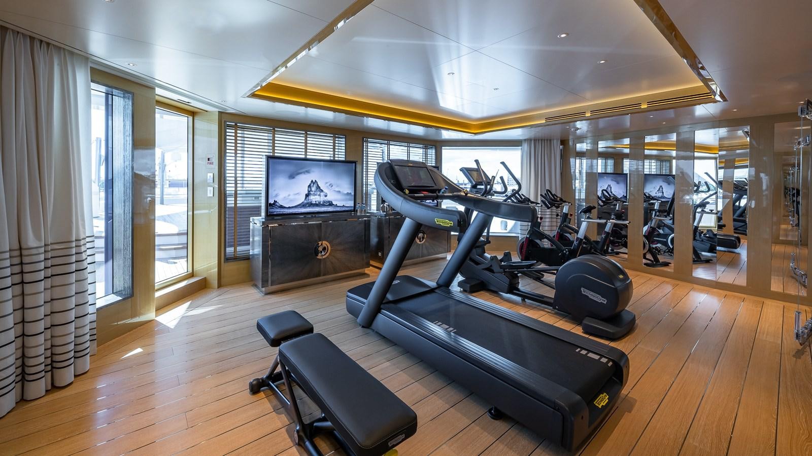 a gym with exercise equipment aboard CC-SUMMER Yacht for Sale