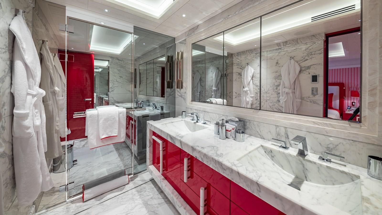 a bathroom with a large mirror aboard CC-SUMMER Yacht for Sale