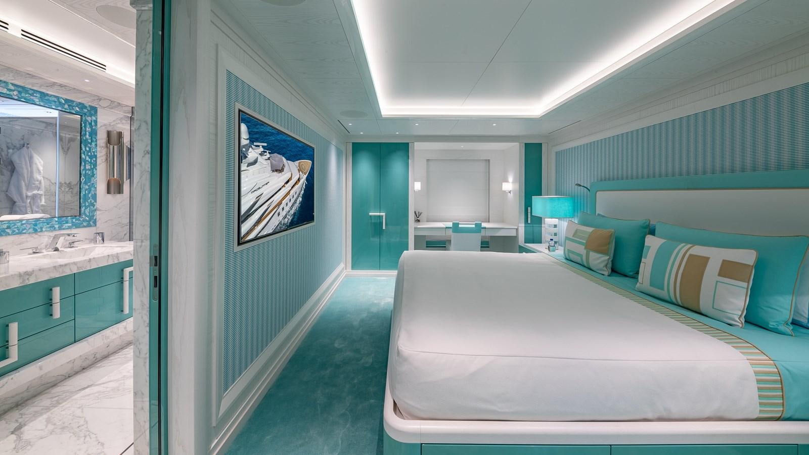 a room with a bed and a desk aboard CC-SUMMER Yacht for Sale