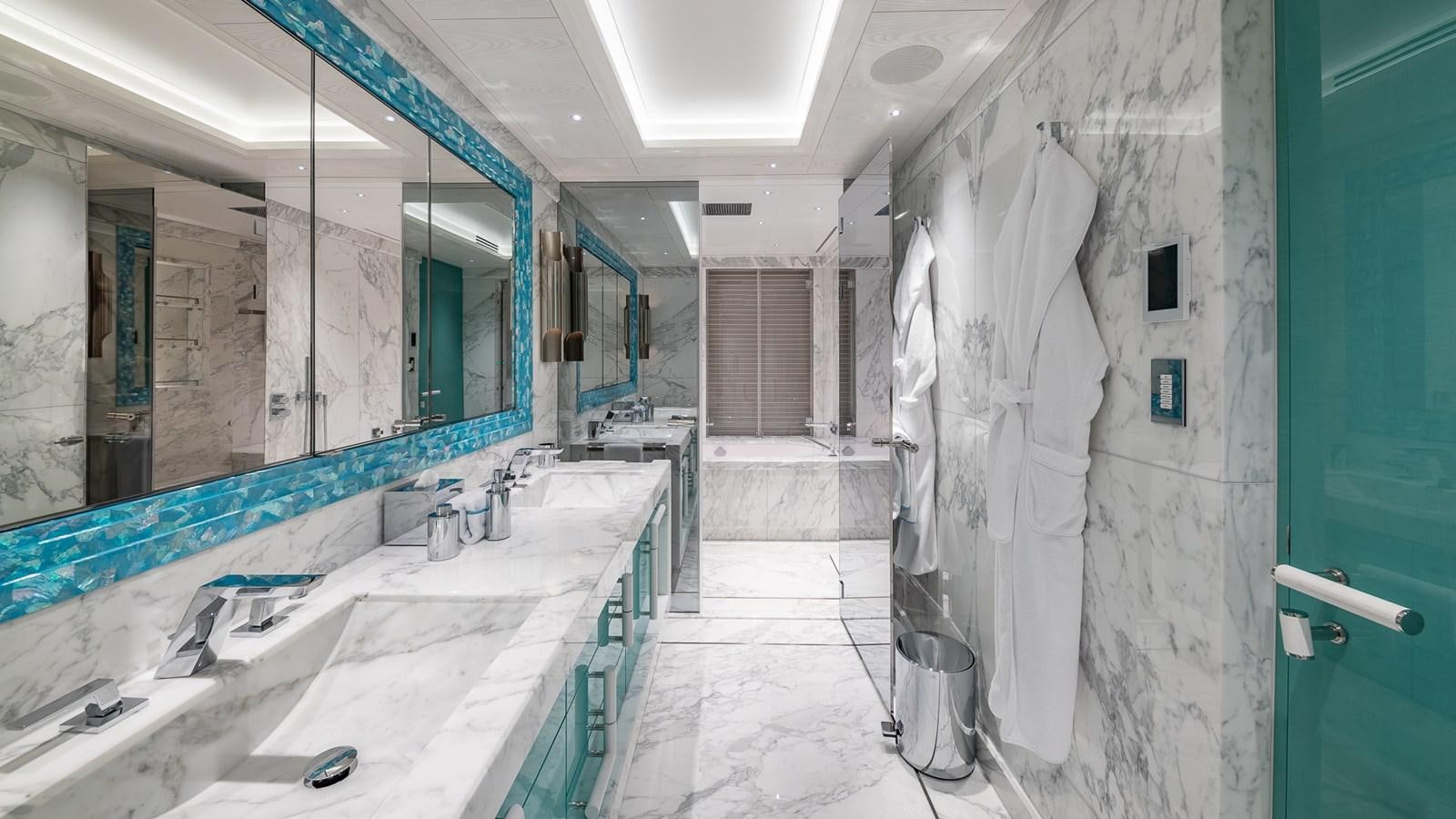 a bathroom with a large mirror aboard CC-SUMMER Yacht for Sale