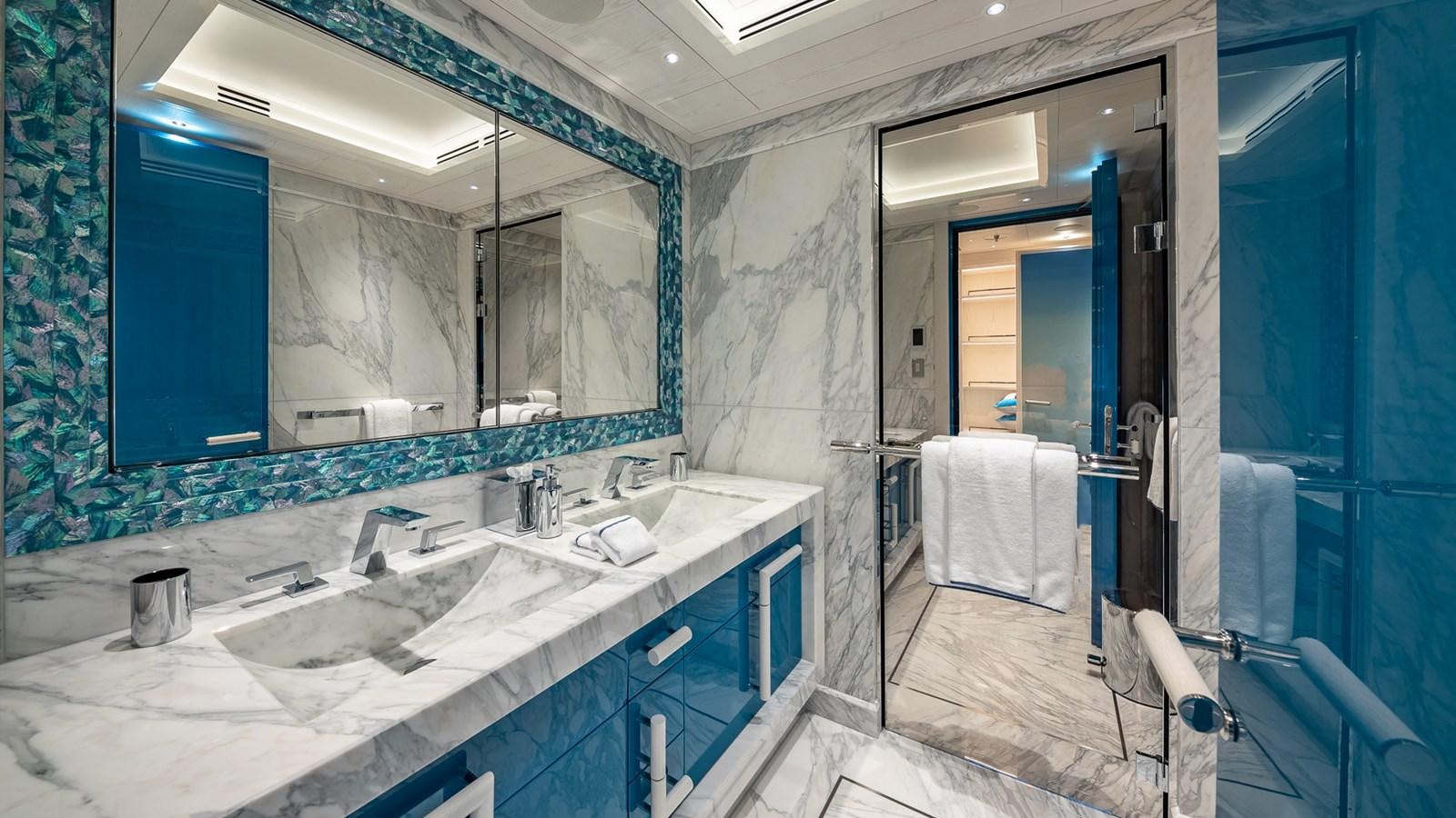 a bathroom with sinks and mirrors aboard CC-SUMMER Yacht for Sale